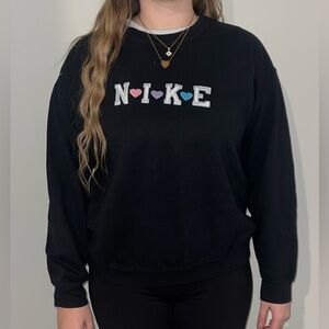 Off brand Nike sweatshirt with colorful hearts